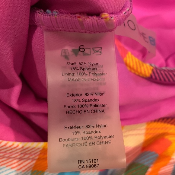 Into the Bleu plaid one piece. Size 6 - Picture 6 of 6